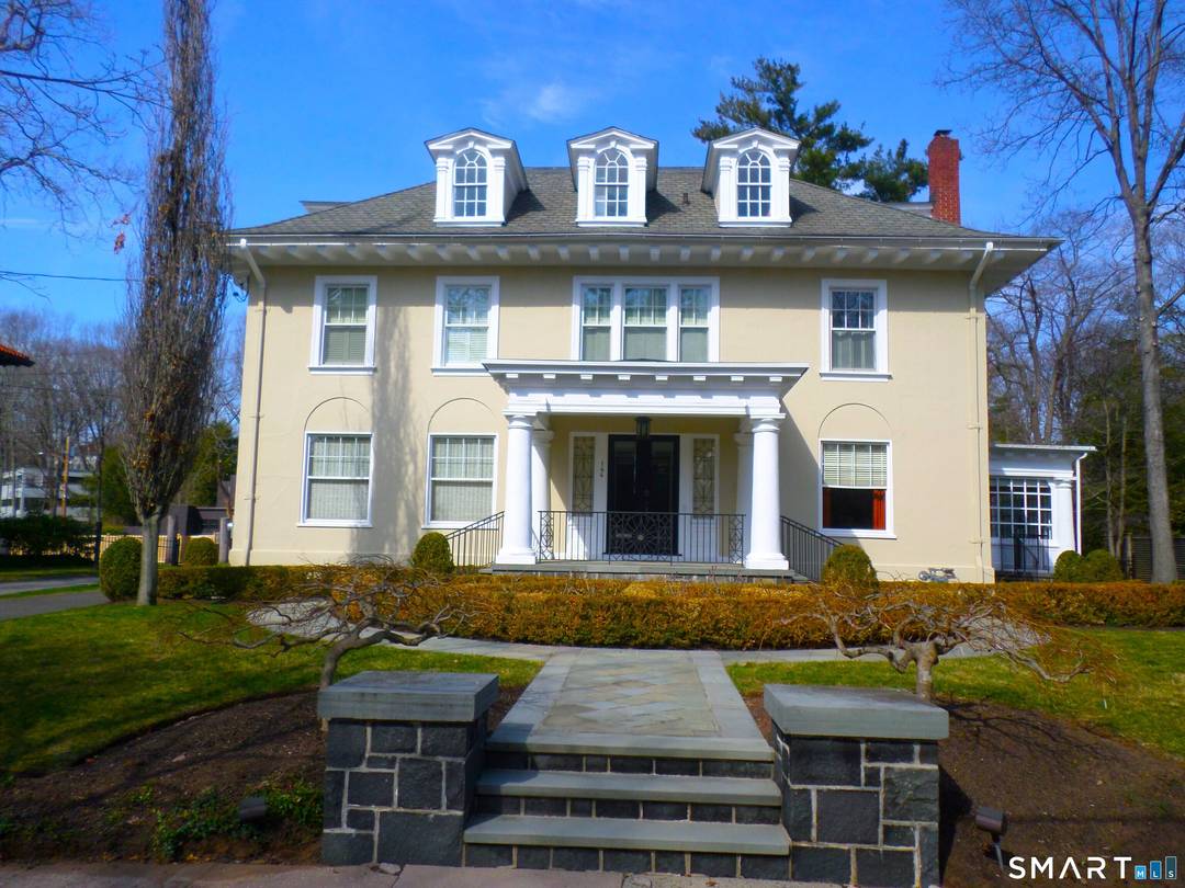 East Rock ! Directly across from Edgerton Park sits this elegant, beautifully proportioned, tastefully restored 1910 Colonial.