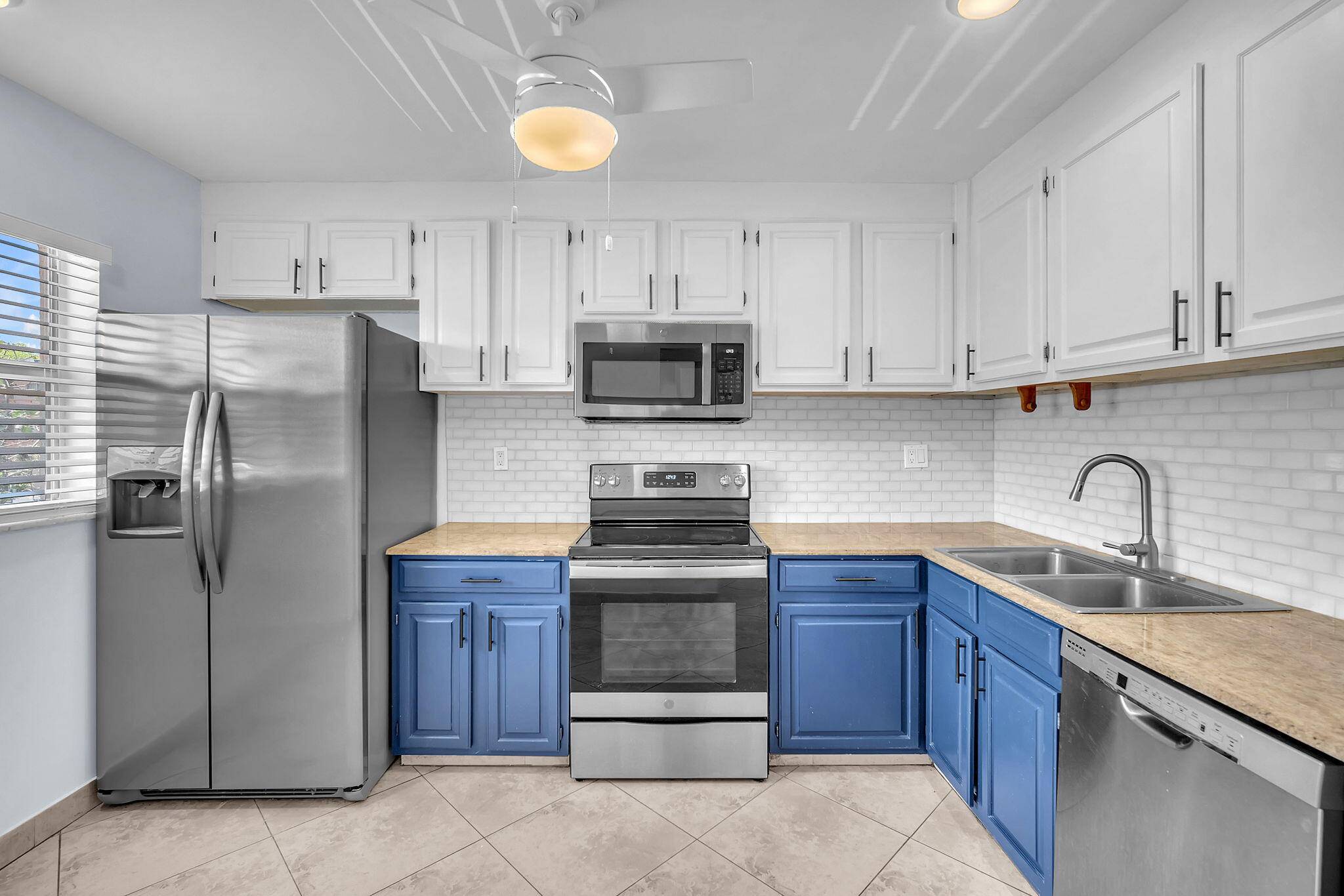 Beautiful, bright and airy corner 2nd floor condo in a well maintained 55 community.