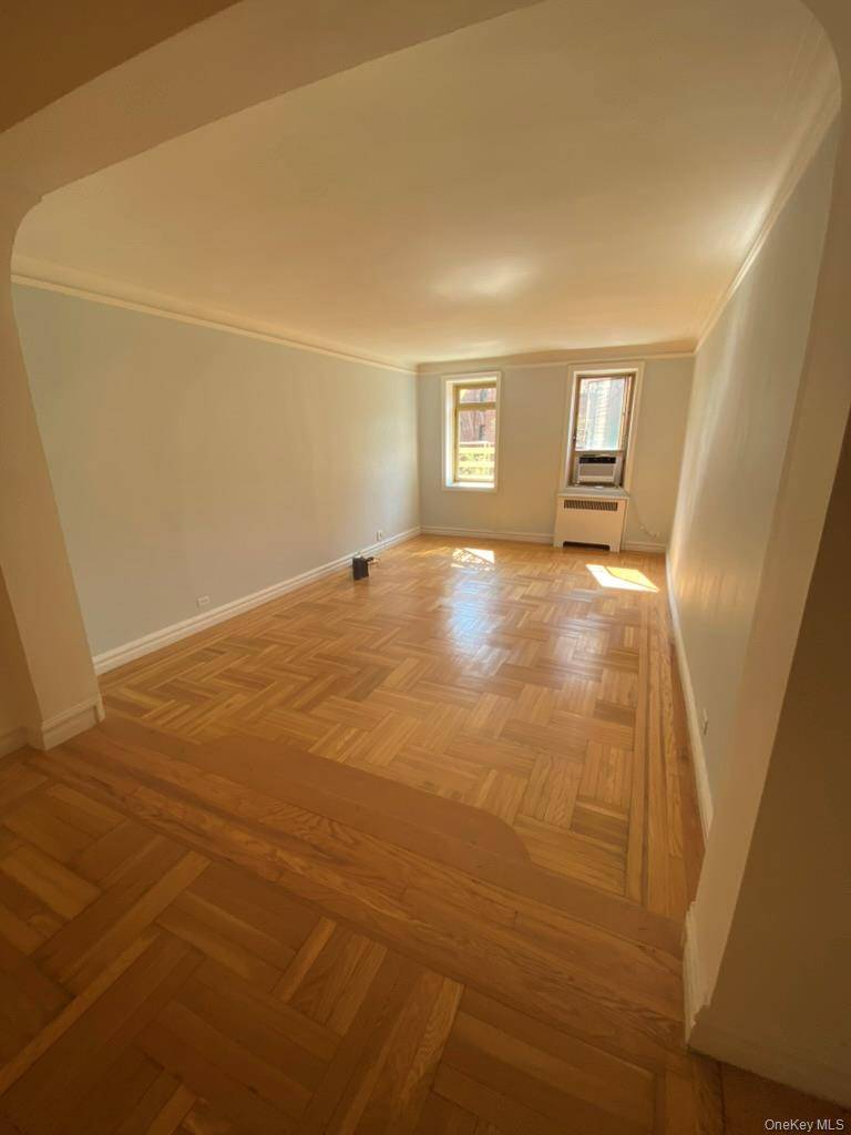 Exceptional Comfort in the Heart of Inwood This beautifully renovated corner two bedroom two bath home has generously oversized rooms with original art deco details that are beautifully highlighted by ...
