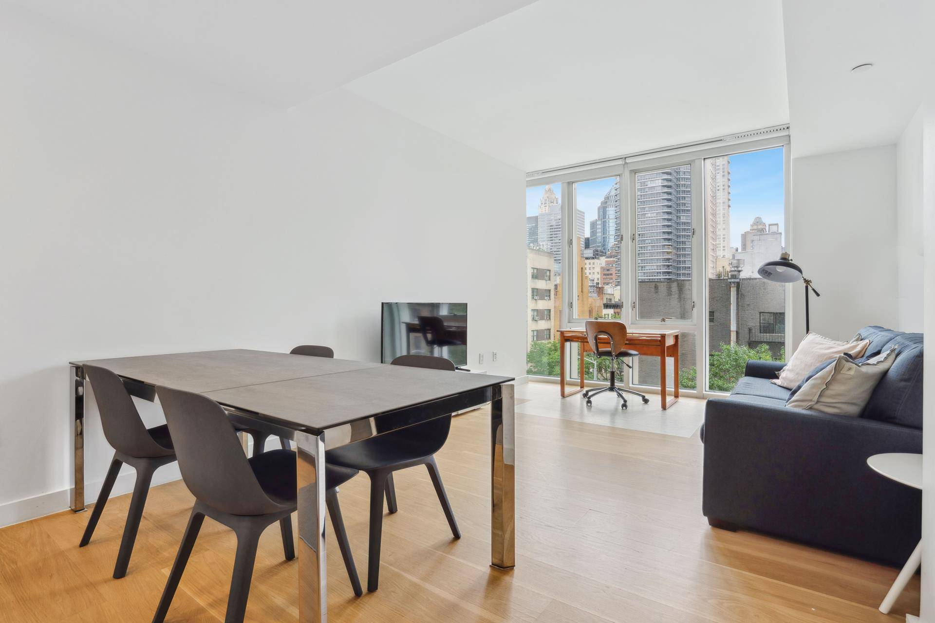 New to Market at the Clare Condominium This is a FURNISHED East facing One Bedroom, One bath with Coveted Washer Dryer in Unit.