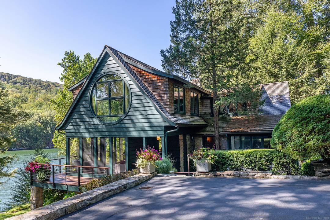 Fabulous summer rental on Candlewood Lake showcases a fully renovated property with high end appointments, 4 BR, 4.