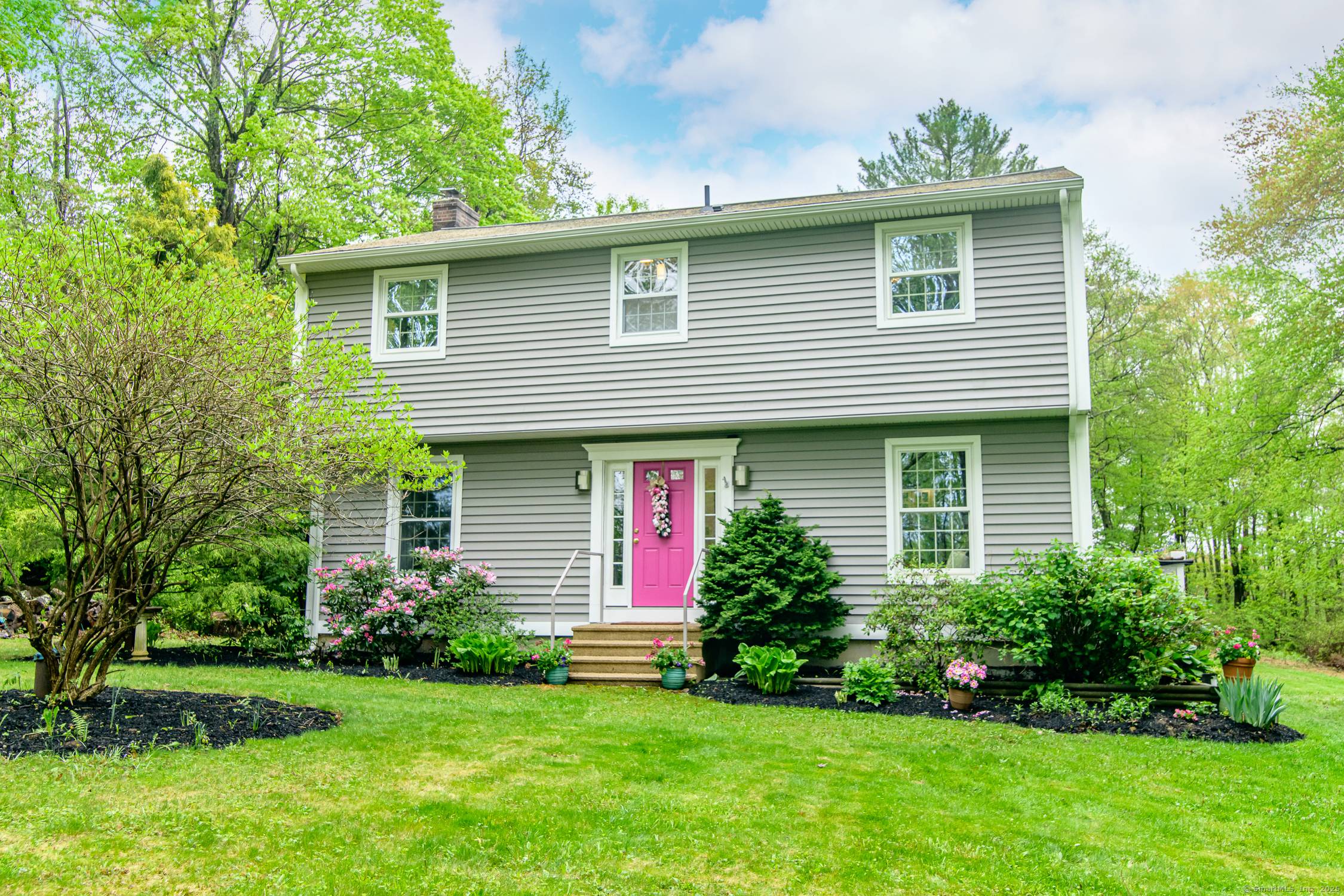 This 4 Bedroom 2. 5 bath meticulously maintained Colonial style home offers a seamless blend of classic charm and modern comfort creating an inviting and functional living environment.