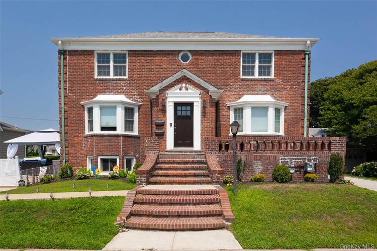 Classic Center Hall Colonial Step into this spacious home featuring a welcoming center hall layout, spacious living room, formal dining room, a bright eat in kitchen that opens to your ...