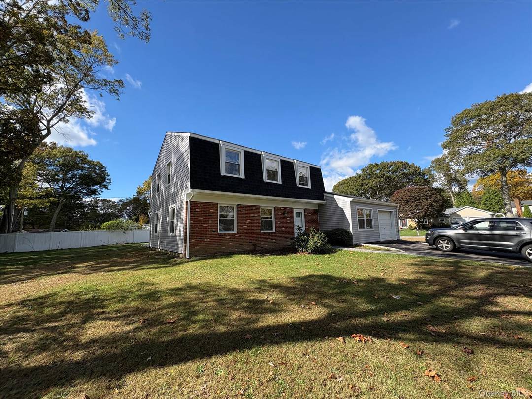 Diamond 4 Bedroom 3 Bath Colonial New Wood Flooring, kitchen, bathrooms, boiler, roof, windows, siding, patio, driveway and more W section Quiet Area