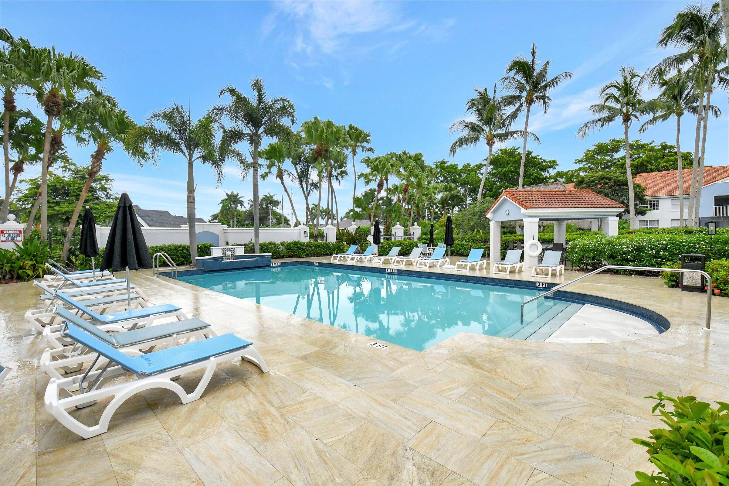 Discover refined living in this renovated 3BR 3BA ground floor corner residence at The Bocar, a sought after gated community in Boca Raton.