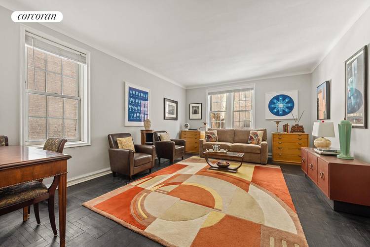 Set above street level with two exposures on to the tranquil courtyard, this home retains its pre war charm and detail throughout.