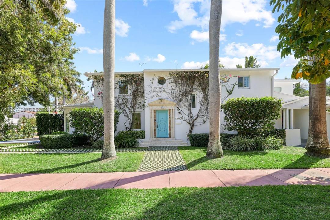 Experience the best of Miami Beach living in this Art Deco corner lot residence.