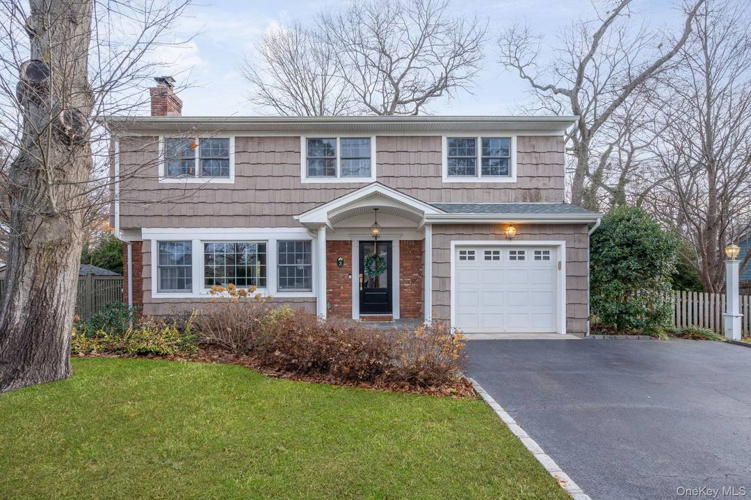 Welcome to this beautifully updated Colonial, offering classic charm paired with modern amenities.