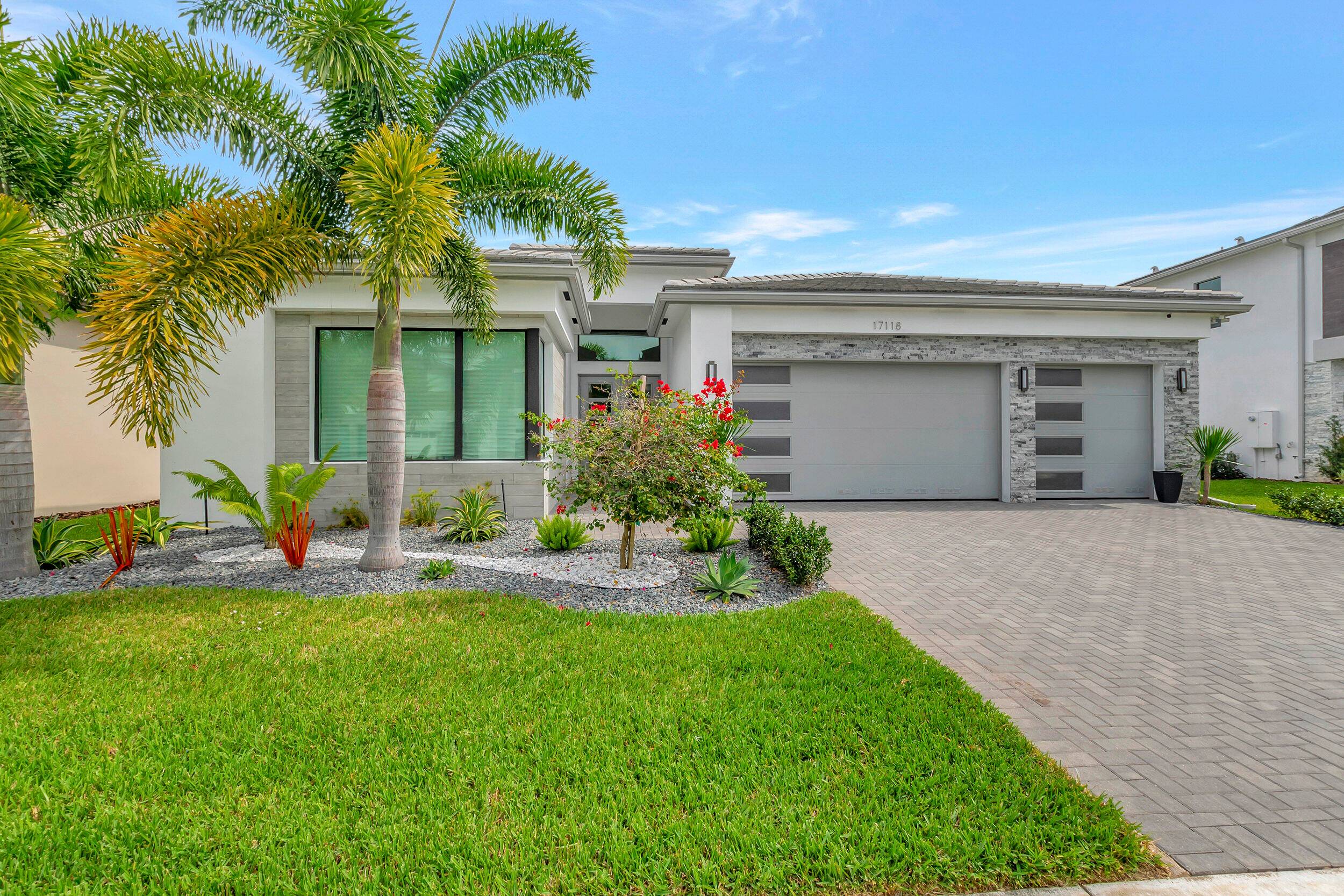 Make this stunning home in Lotus your own This home is new construction that has been customized and designer decorated from top to bottom.