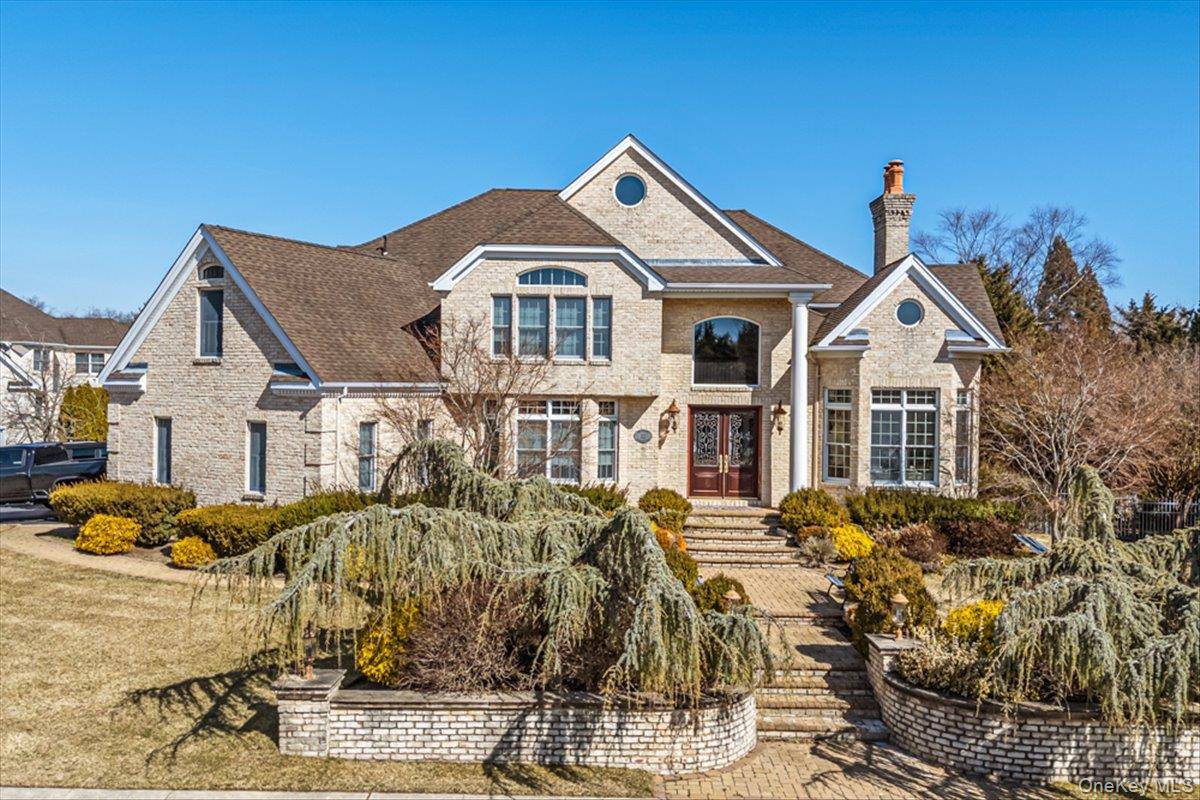 This six bedroom, four and a half bath Colonial home is nestled in The Country Pointe prestigious gated community in Dix Hills offering a perfect blend of classic charm and ...