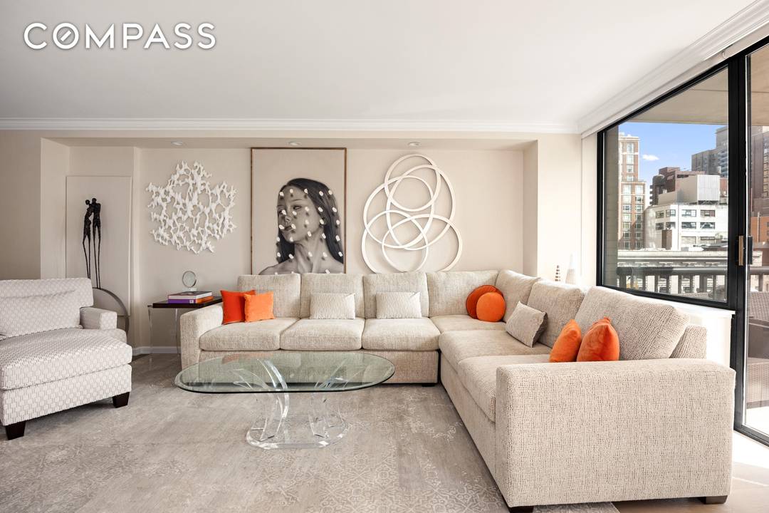 Welcome to 171 E 84th Street, 7B, a Triple Mint, Designer Renovated Two Bedroom, Two and half Bathroom Condominium with a washer dryer and private balcony.