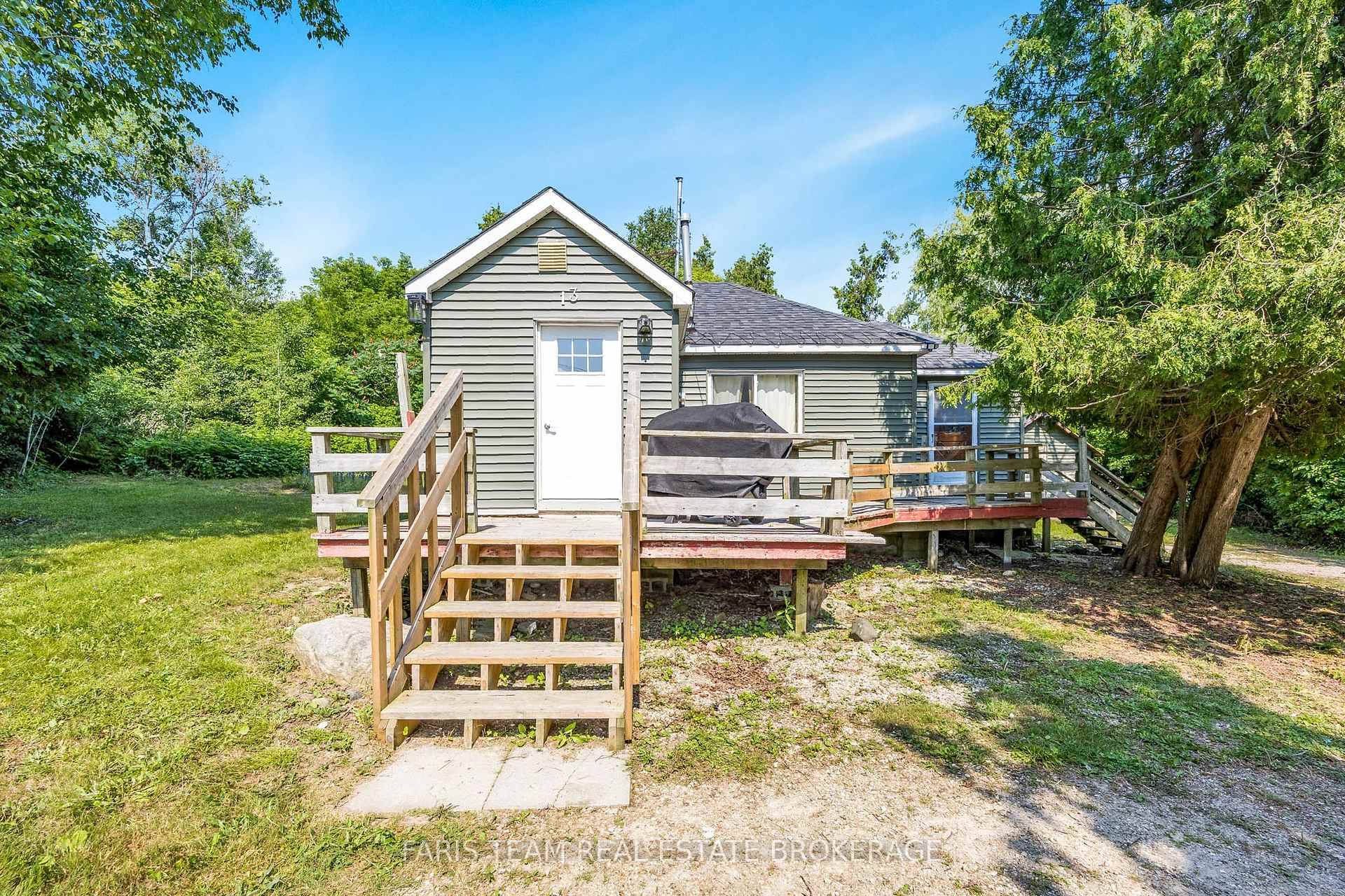 Top 5 Reasons You Will Love This Home 1 Generous lot only a 10 second walk from the beach, offering ample space and the perfect location 2 Fully winterized and ...
