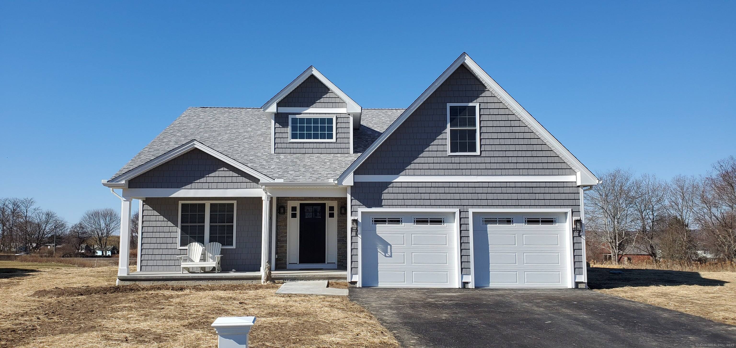 Modern Ranch style home in Mystic !
