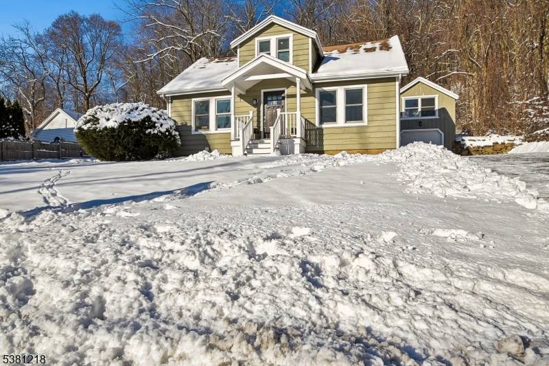 Charming Cape Cod on nearly one acre in Mendham Township's desirable east side.