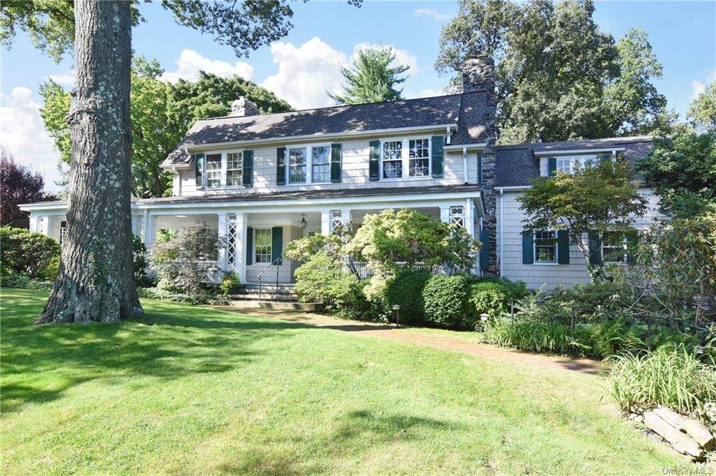 This warm and inviting 1910 Dutch Colonial is conveniently nestled in the heart of Pelham.