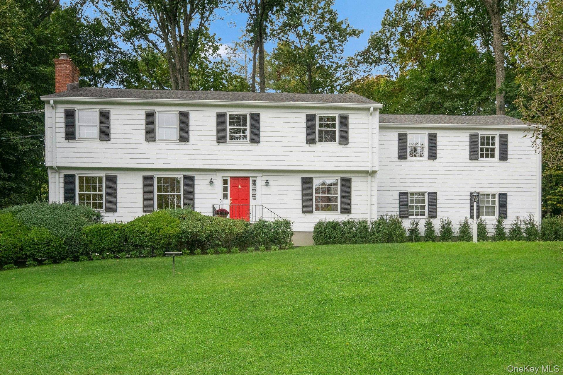 Gracious, sun drenched Colonial in the Briarcliff School District, set in a coveted estate area.