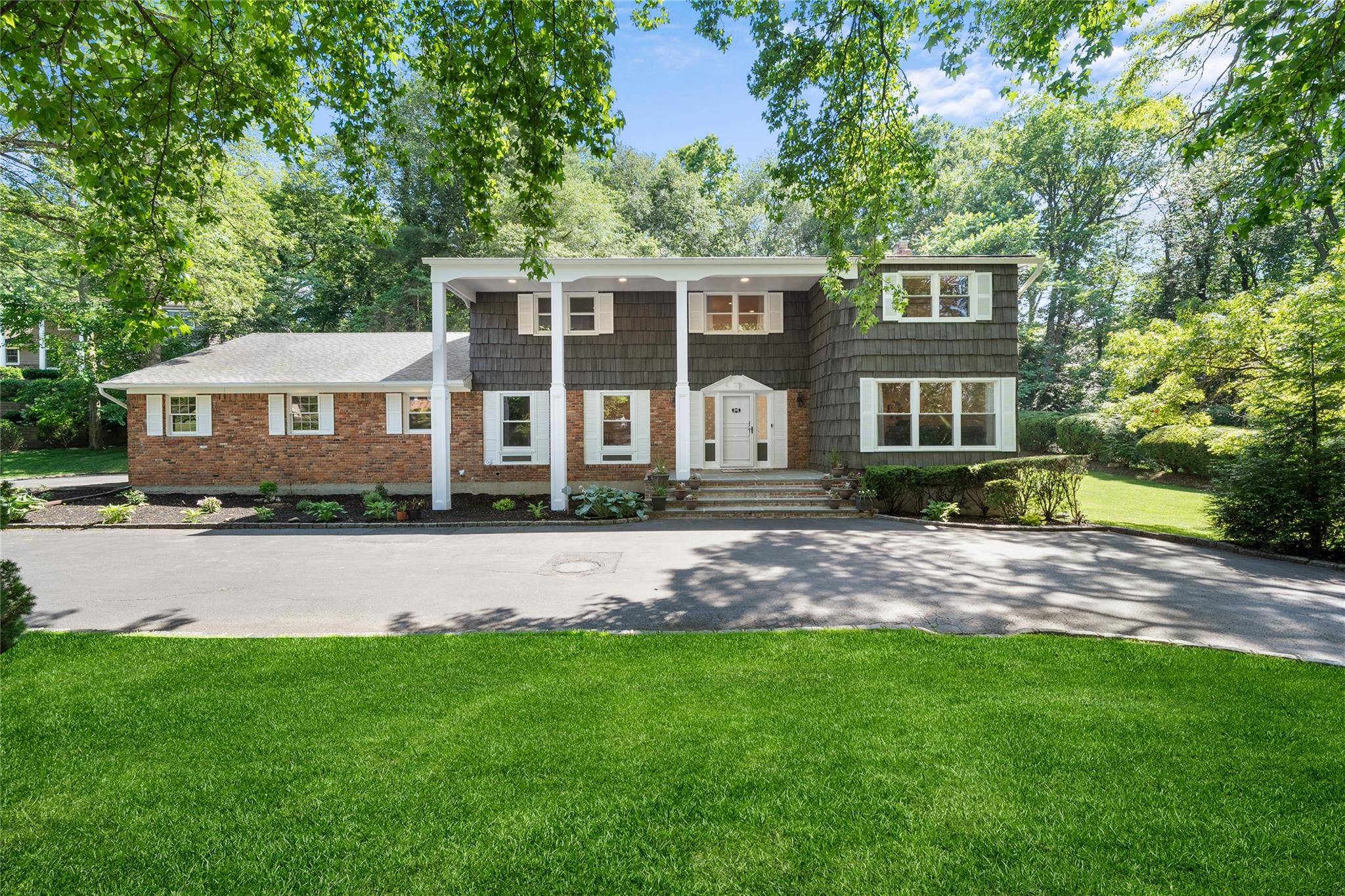 Set on a lush, private acre in the heart of Woodbury, this beautifully maintained Colonial offers timeless curb appeal, generous space, and the kind of quiet privacy that s hard ...