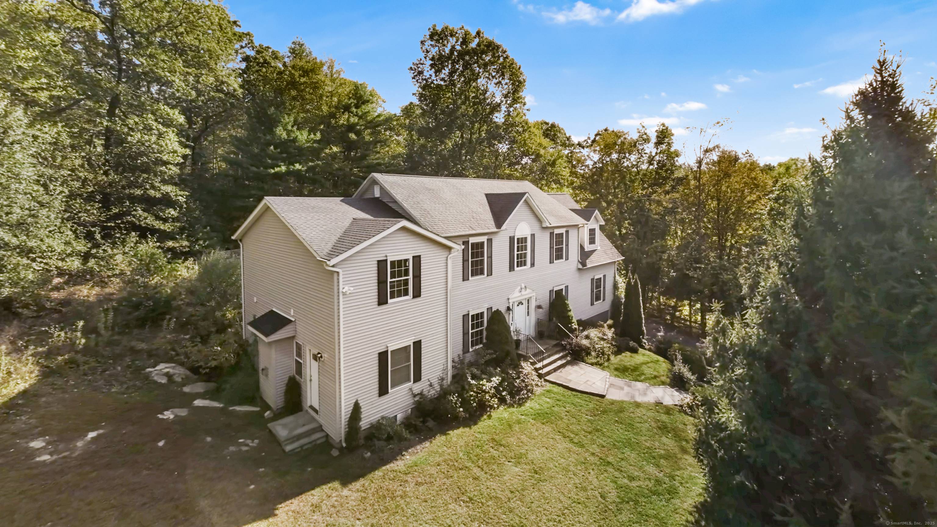 Welcome to this extraordinary colonial home on 2 Abbey Lane in Newtown, CT !
