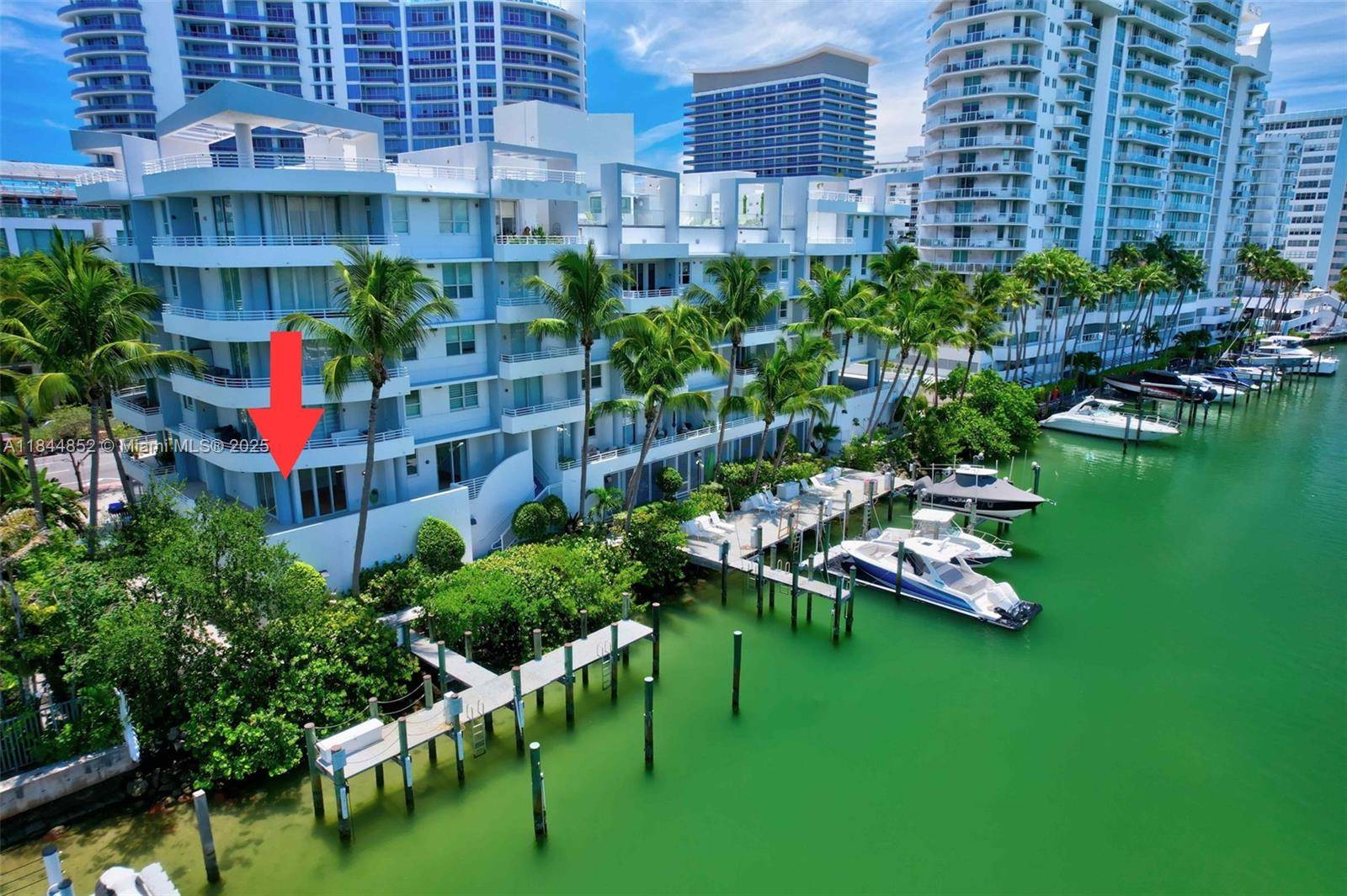 DIRECT INTRACOASTAL WATER VIEWS from this CORNER LANAI featuring an OVERSIZED WRAP AROUND COVERED TERRACE w nearly 900 SqFt and water hose.