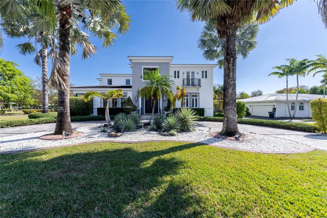 Stunning Corner Home in Gables by the Sea This exceptional corner residence offers the ultimate in luxury and comfort.