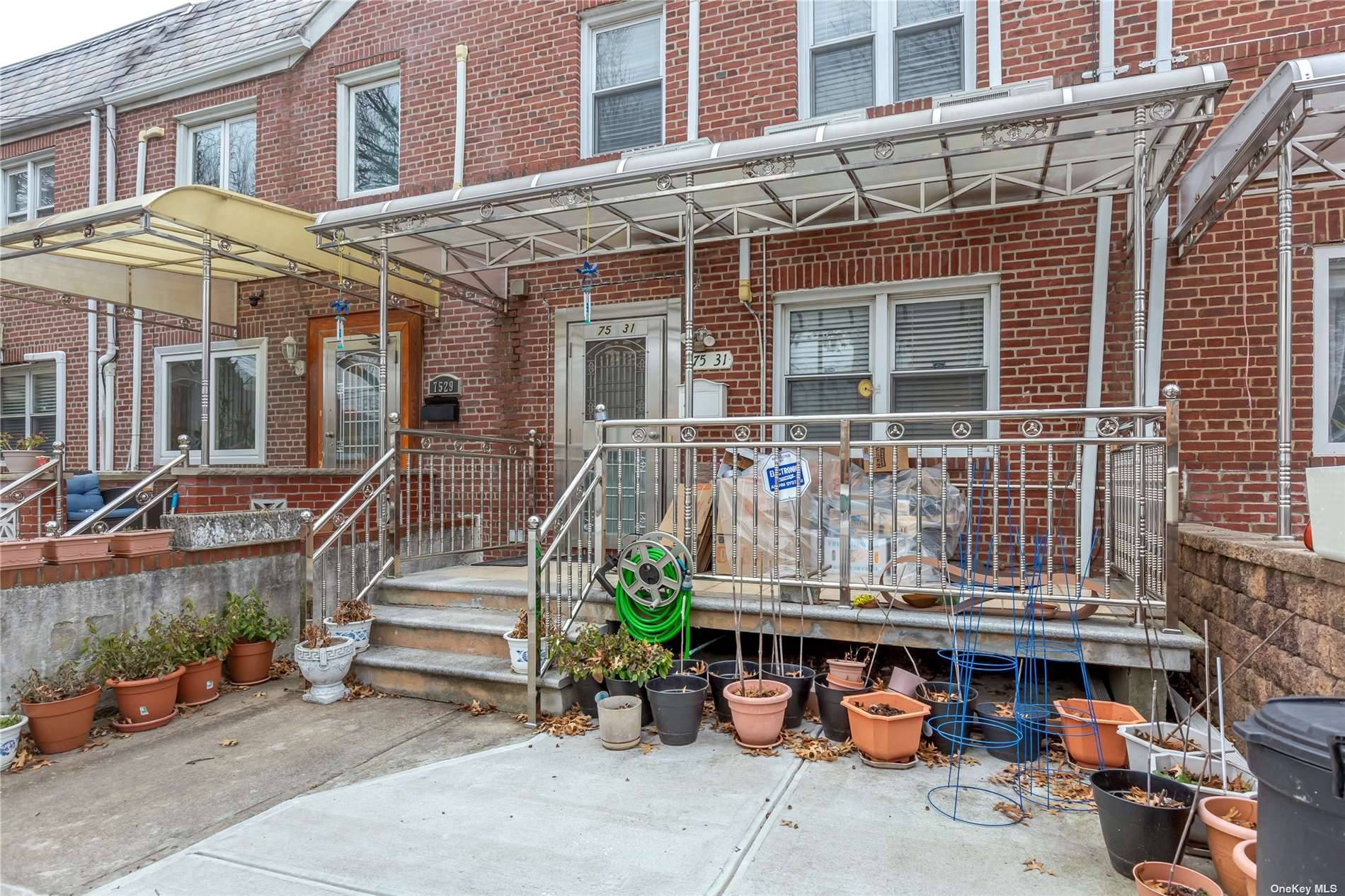 Beautiful one family brick attached townhouse located in the prime location of Fresh Meadows.