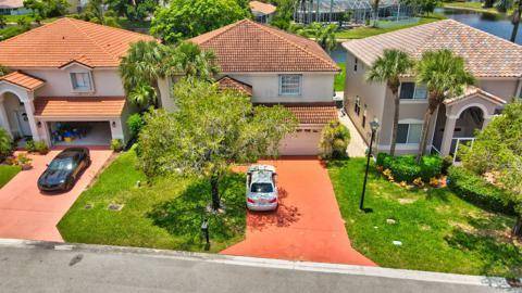 Gorgeous Waterfront Home in Desirable Boca ChaseThis beautifully remodeled 4 bedroom, 2.