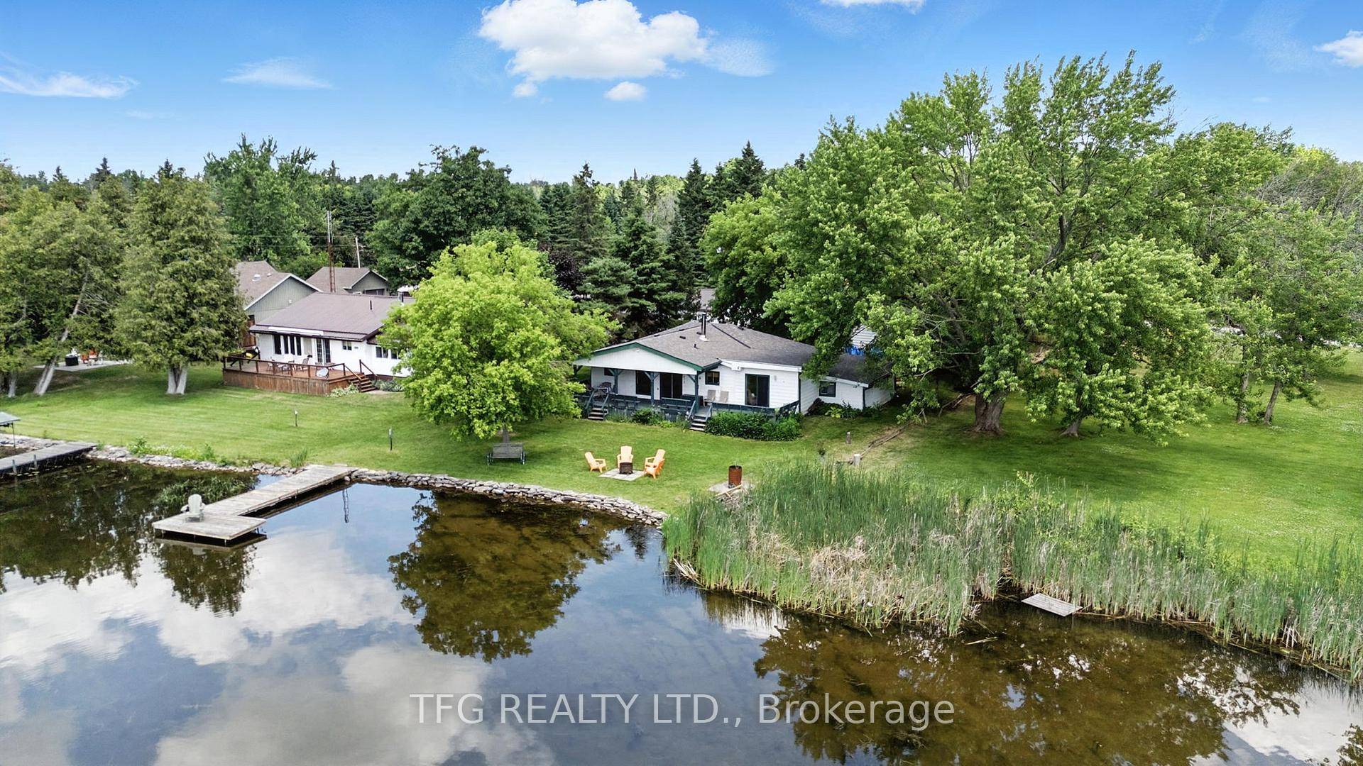 2 Separate Properties Waterfront oasis with western exposure on the beautiful Trent River with 70' of water frontage with dock and walk in shoreline.