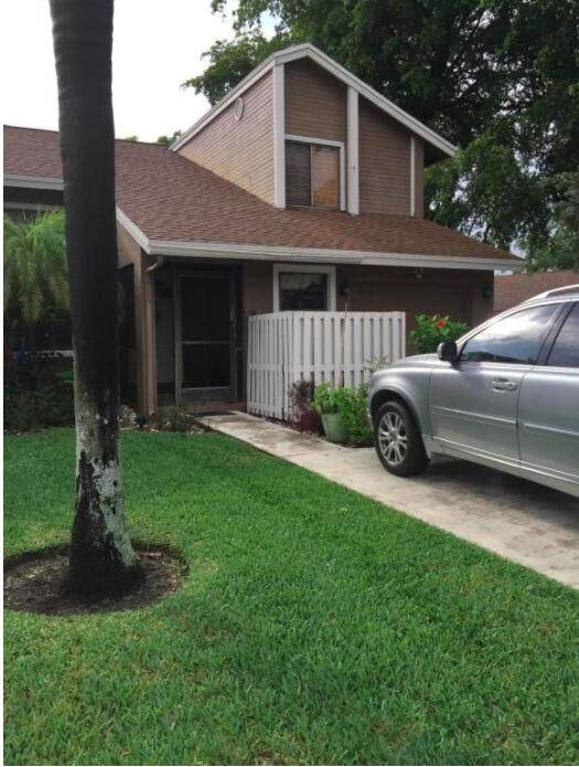 Beautiful extended end unit two story townhouse feels like single family home located in Timber Walk II, Logger's Run community.