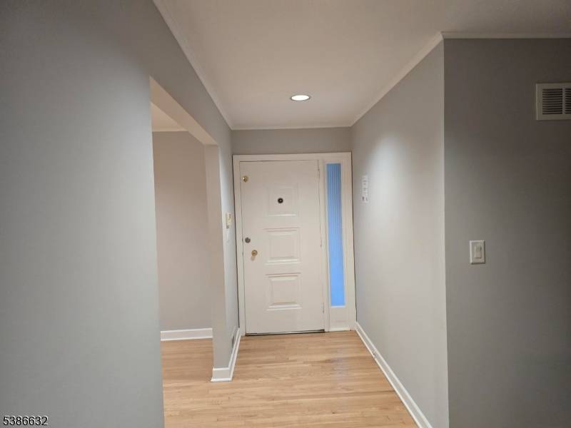 A fabulous well maintained ranch boasts three bedrooms and two a half bathrooms.