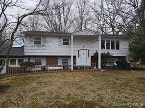 Nice spacious house 5 bedrooms 3 bathrooms enough living space for the whole family Close to everything Well kept high ranch in prime Chestnut Ridge location.
