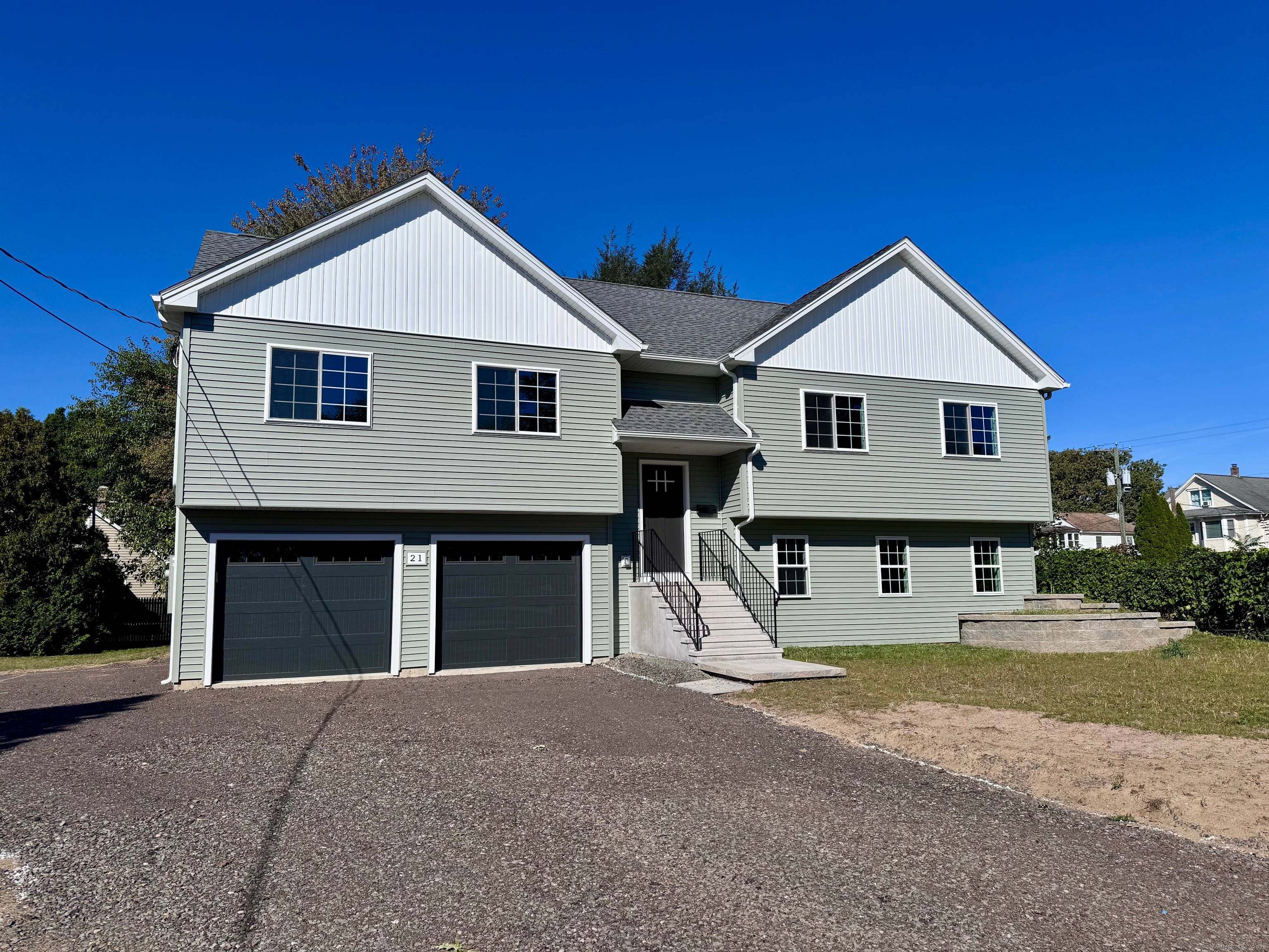 Experience modern living at its finest in this brand new, oversized raised ranch.