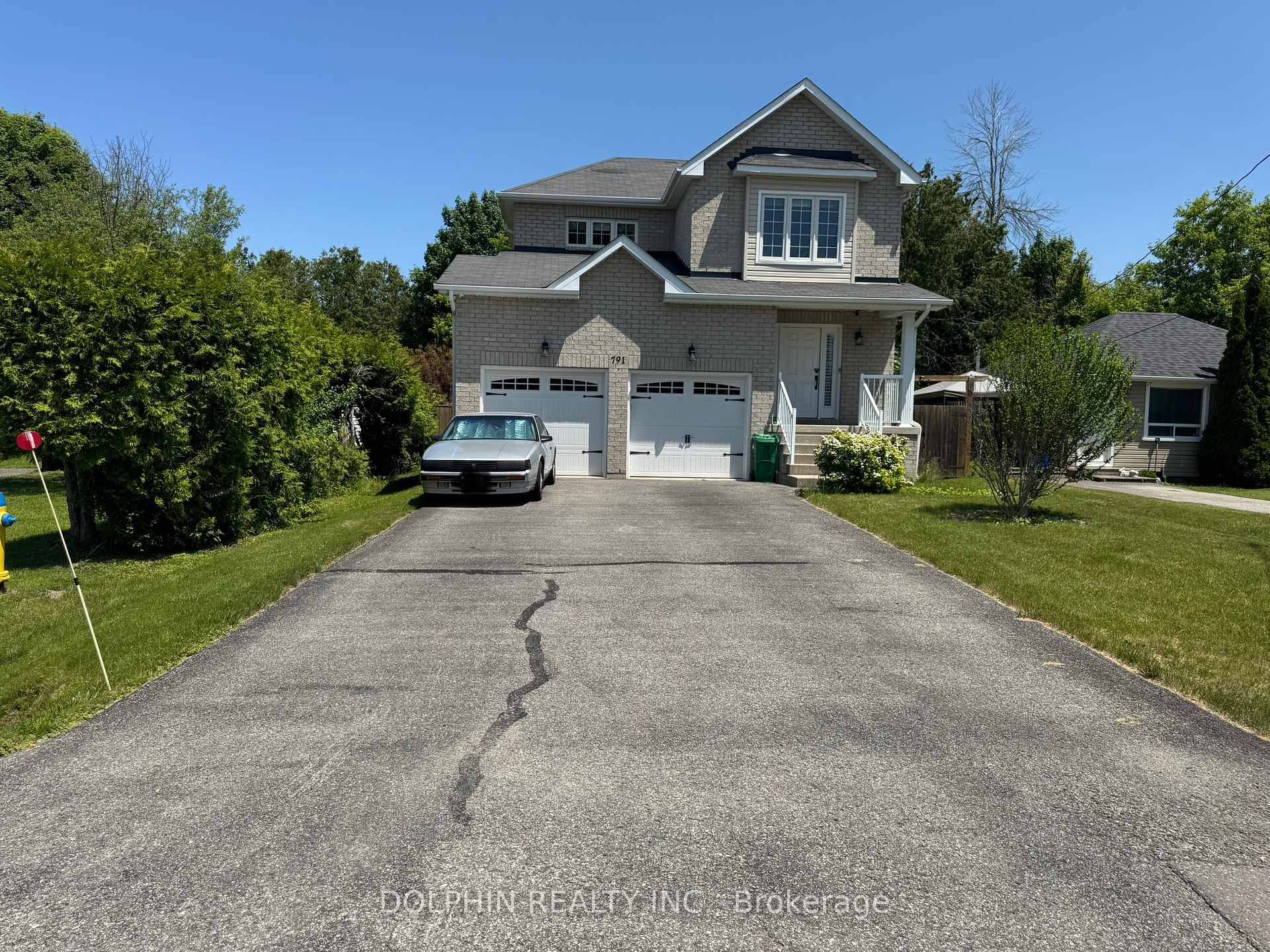 Newly Renovated ! Your Dream Lakeside Retreat Awaits Luxurious 3 Bed, 4 Bath Home on a 50x130 Ft Lot with Deeded Access to Willow Beach !