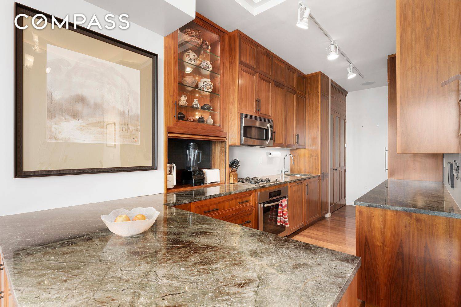 Highly coveted, rarely available, renovated, front facing, 2B 2B with 11 foot ceilings and sweeping views of Seward Park !