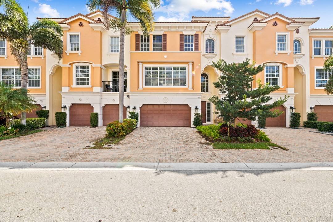 Welcome to this beautifully appointed, modified Bellavita model 3 story townhouse with a private elevator for added convenience that provides access to all levels.
