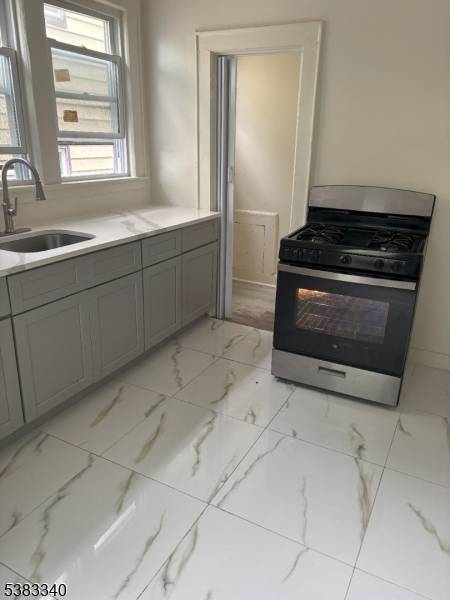 BEAUTIFUL THREE FAMILY HOME.