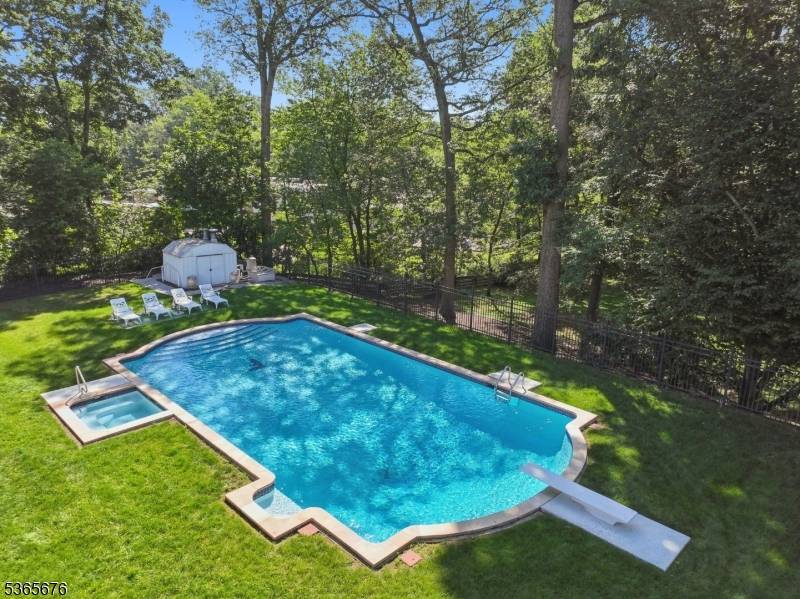 Welcome to this stunning custom home in sought after Mountainside, offering nearly 3, 900 sq.