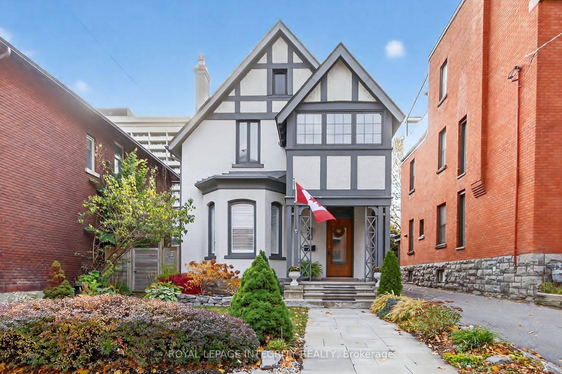 Step into history with this beautiful Tudor style home built in 1872.