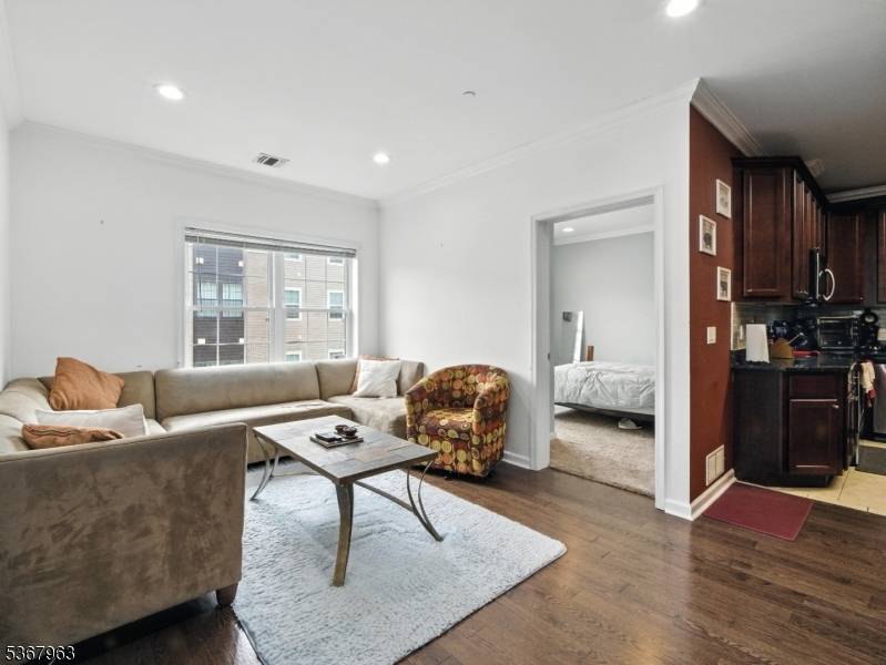 This bright and airy 3 bedroom, 2 bathroom corner unit is located in a LEED Certified, high efficiency GREEN building designed with comfort and sustainability in mind.