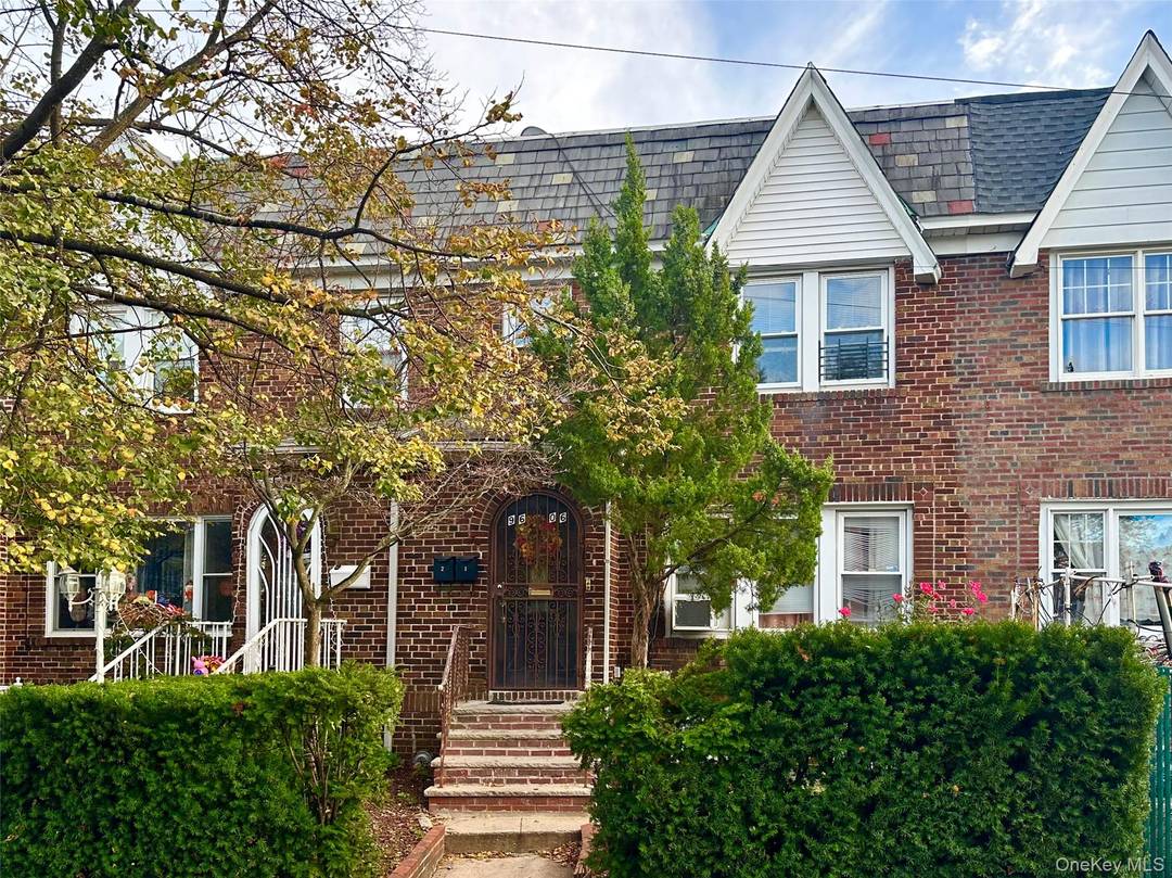 Welcome to a well maintained two family brick townhouse, perfectly located on a quiet, convenient block in prime Ozone Park location.