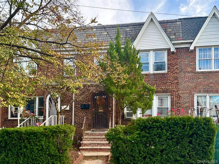 Welcome to a well maintained two family brick townhouse, perfectly located on a quiet, convenient block in prime Ozone Park location.