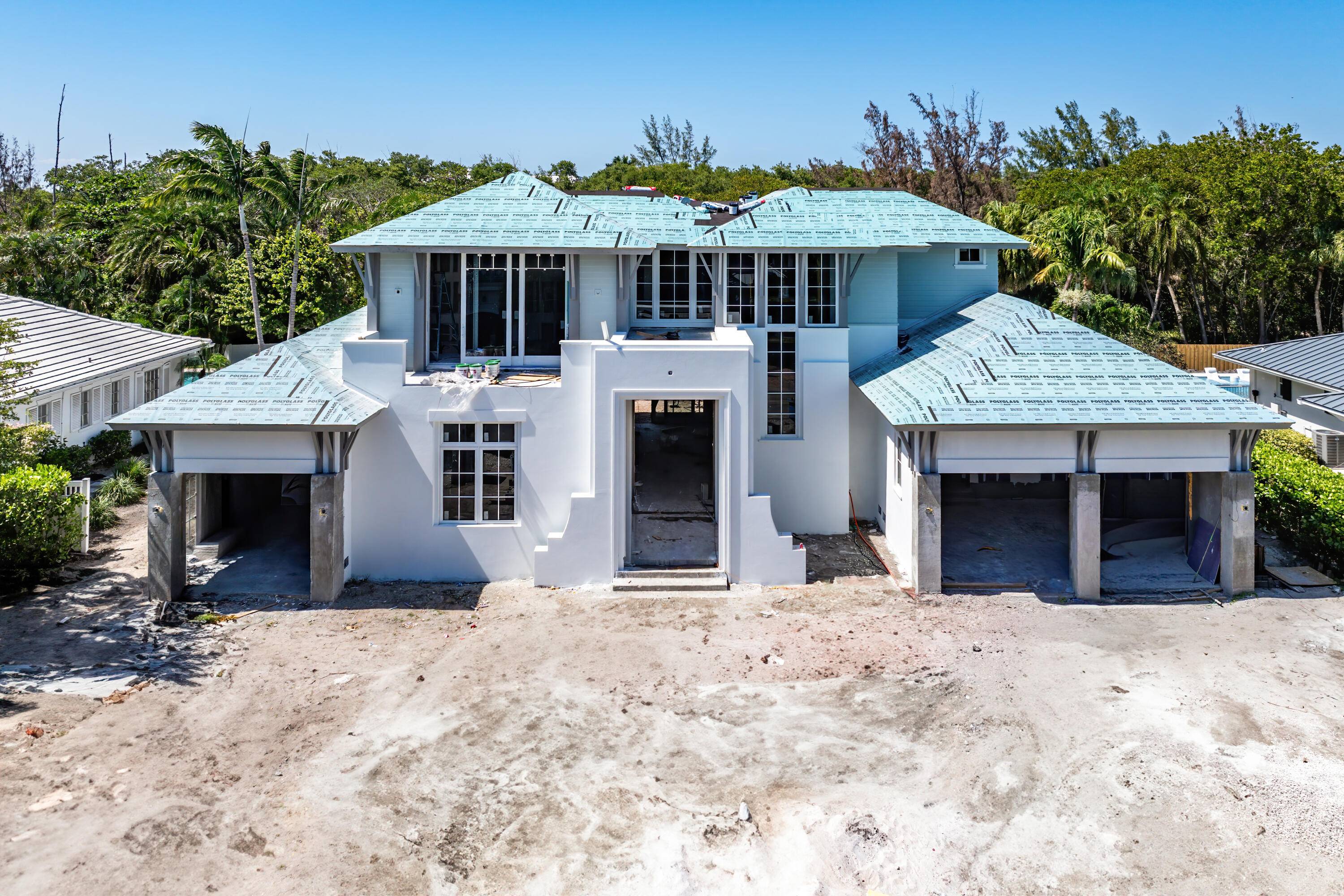 Sleek Coastal New Construction in Delray IslesJust 2.