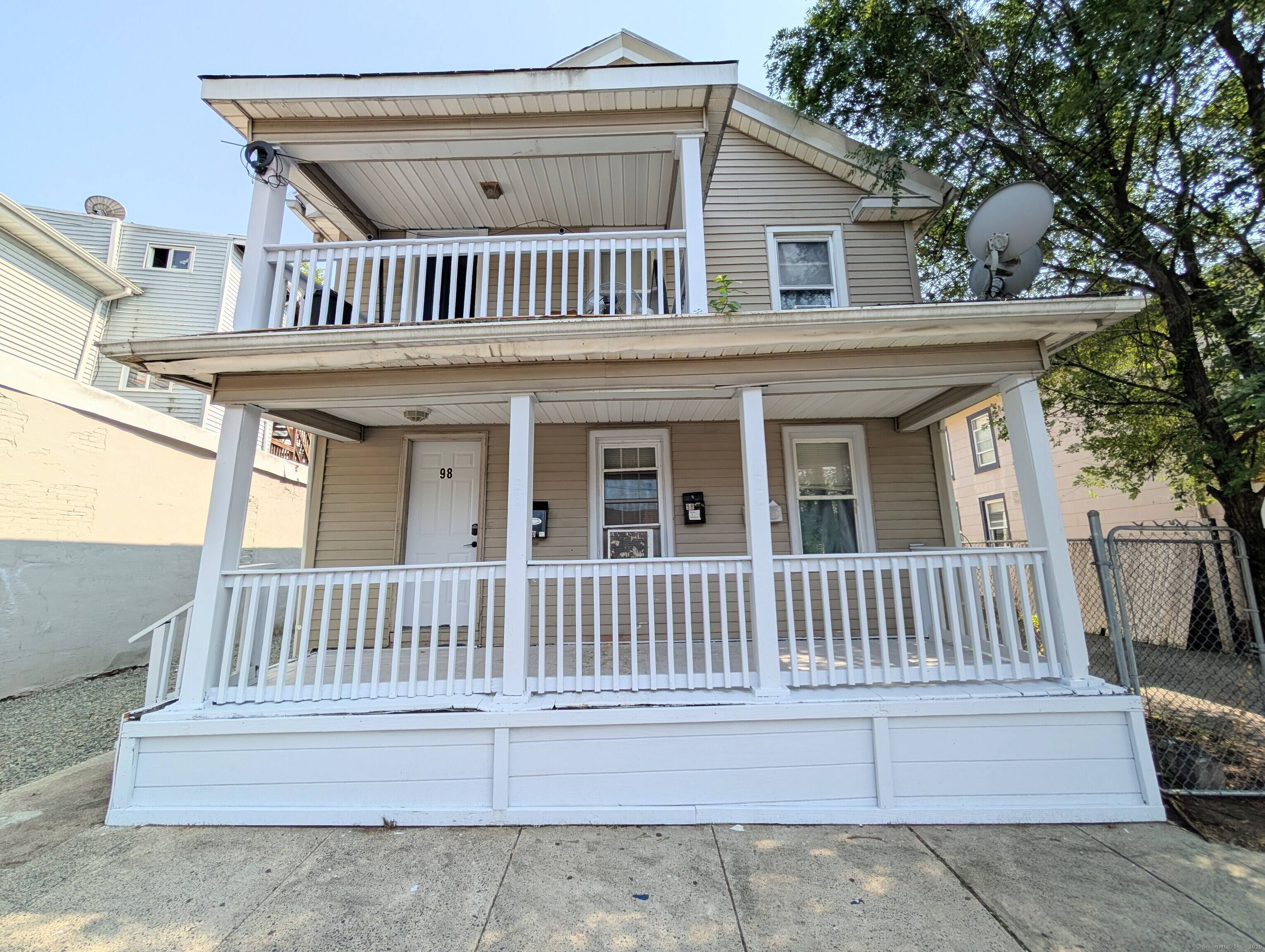 Unique double parcel 3 family with two identical 3 bedrooms apartments on the 1st and 2nd floors.