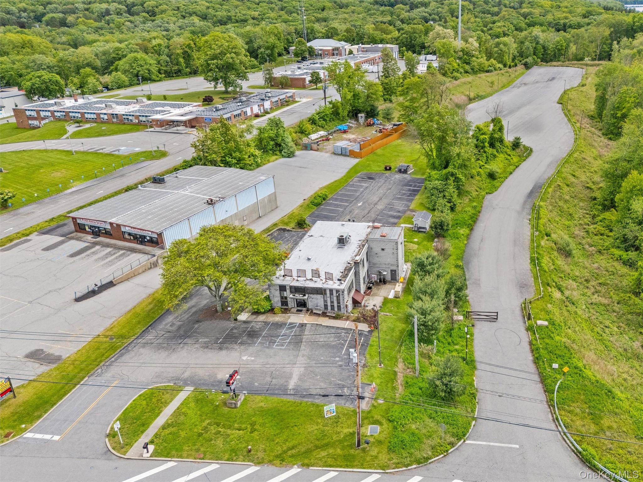 REDUCED ! 5, 758 SQFT COMMERCIAL BUILDING with Public Sewer and Public Water AND a TRAFFIC SIGNAL.