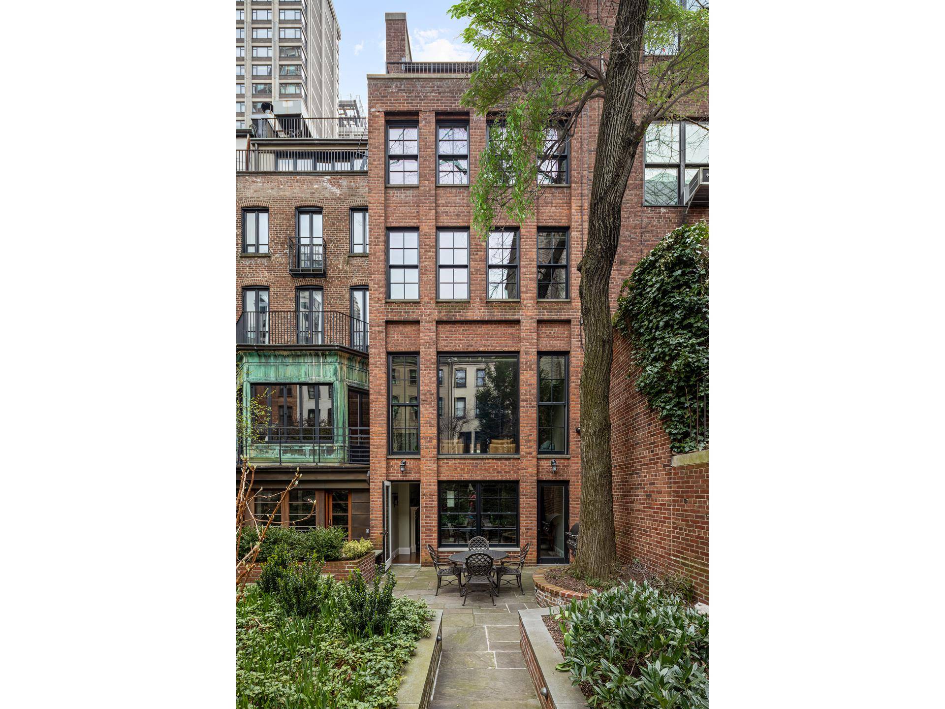 COVETED CORNER HOUSE ON JONES WOOD SECRET GARDEN Welcome to 157 East 65th Street, the largest and most coveted corner house on Jones Wood, an exclusive 110' x 80' European ...