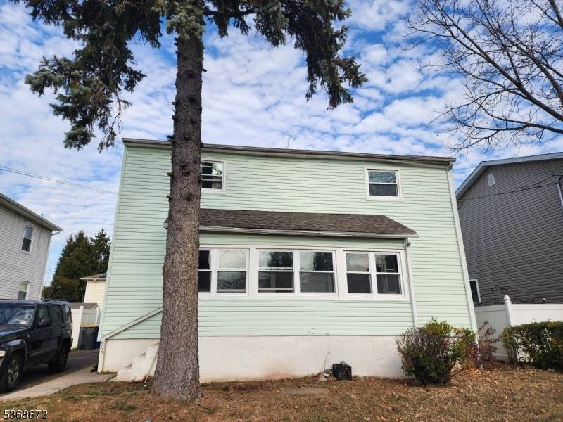 This well laid out home offers plenty of space, showcasing five generously sized bedrooms and two full bathrooms, providing flexibility and functionality for modern living.
