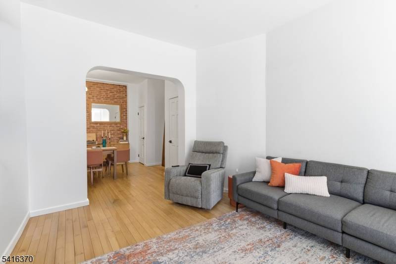 STUNNING. Completely renovated, all brick single family home with potential to be converted into a two family for rental income.