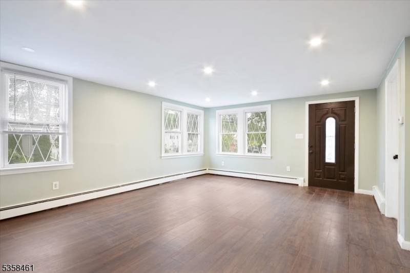 This beautifully renovated three level home for rent offers exceptional space, flexibility, and ultra modern upgrades throughout.