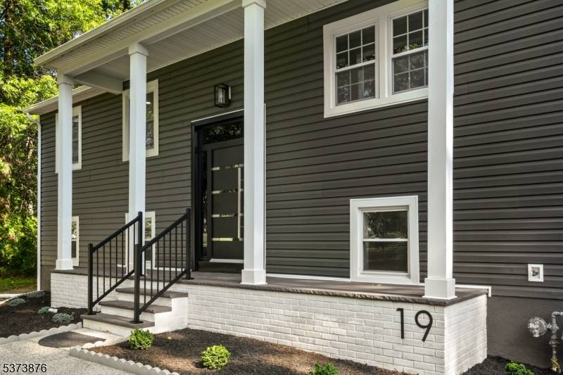 Tucked into a sought after Basking Ridge neighborhood, this redesigned and renovated home offers the perfect blend of modern sophistication and everyday comfort.