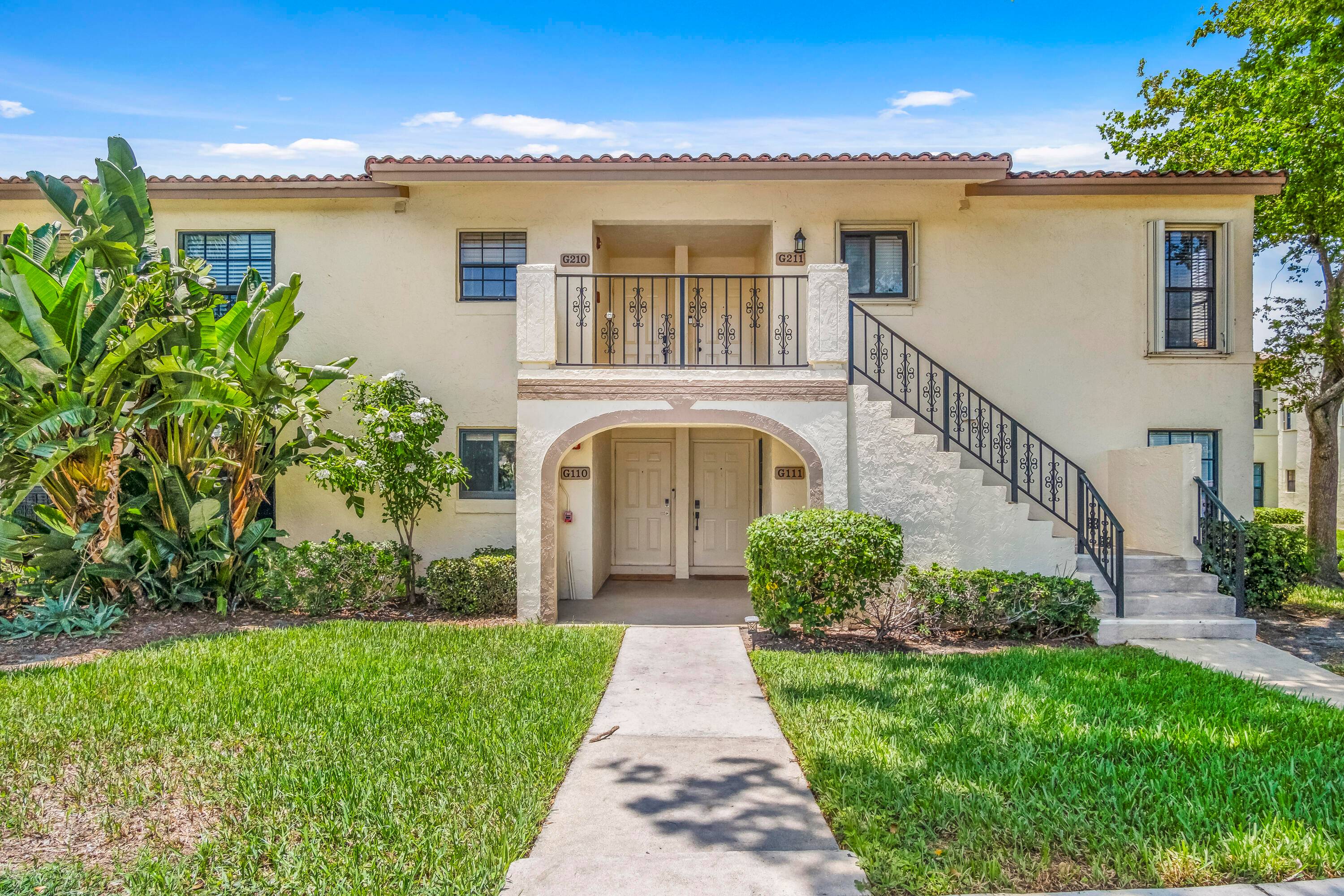 Welcome to Windwood ! Experience lakefront living in one of East Boca's most sought after gated communities !