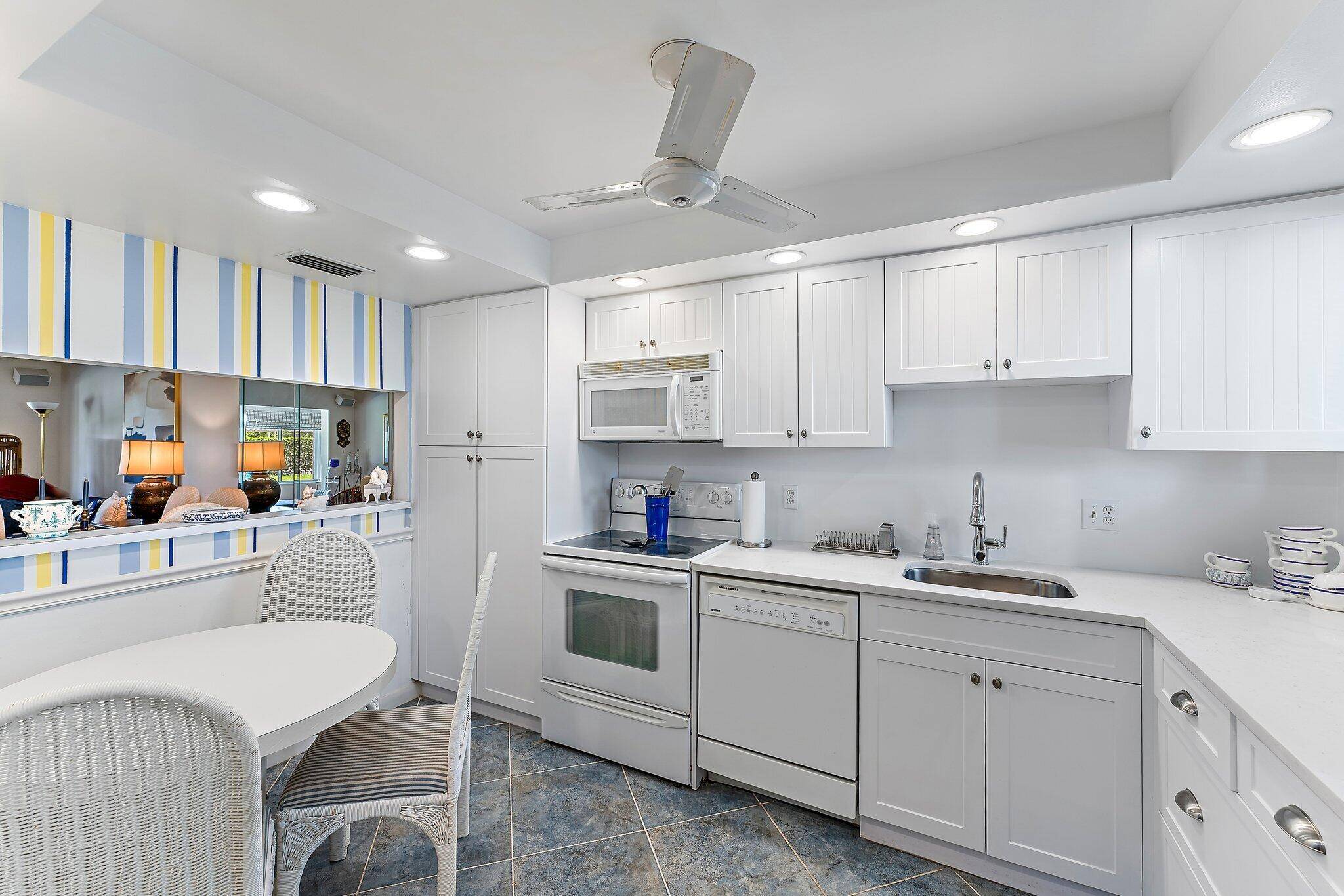 Updated first floor condo located in the sought after community of Poinciana Lakes.